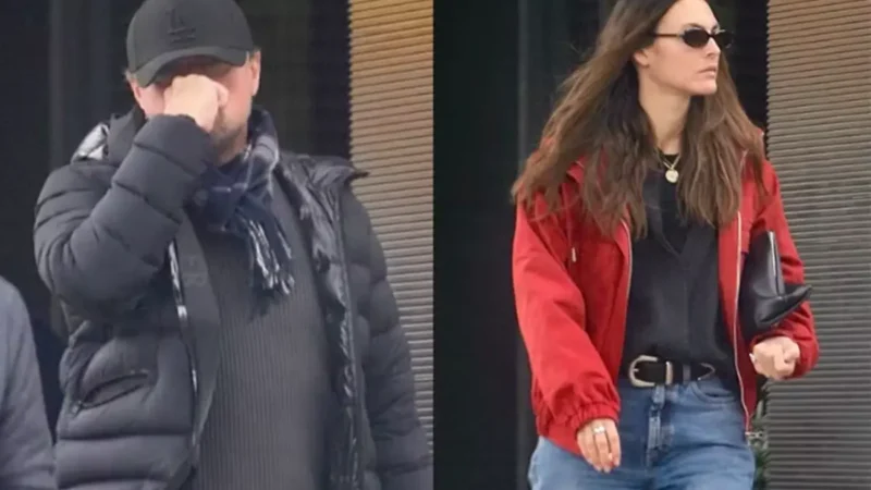 Leonardo DiCaprio cobre o rosto ao carregar resto do almoço ao lado da namorada em Beverly Hills