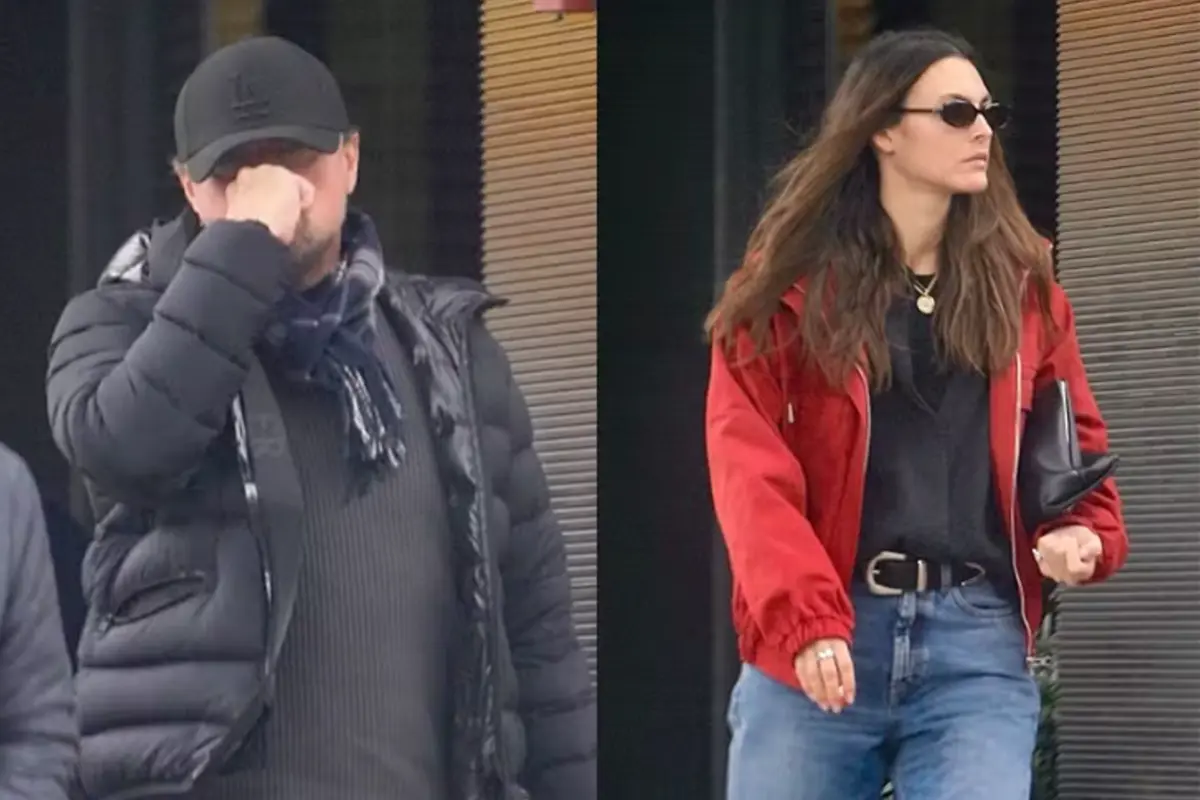 Leonardo DiCaprio cobre o rosto ao carregar resto do almoço ao lado da namorada em Beverly Hills