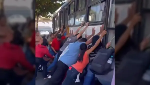 Populares erguem ônibus para salvar motociclista em Aparecida