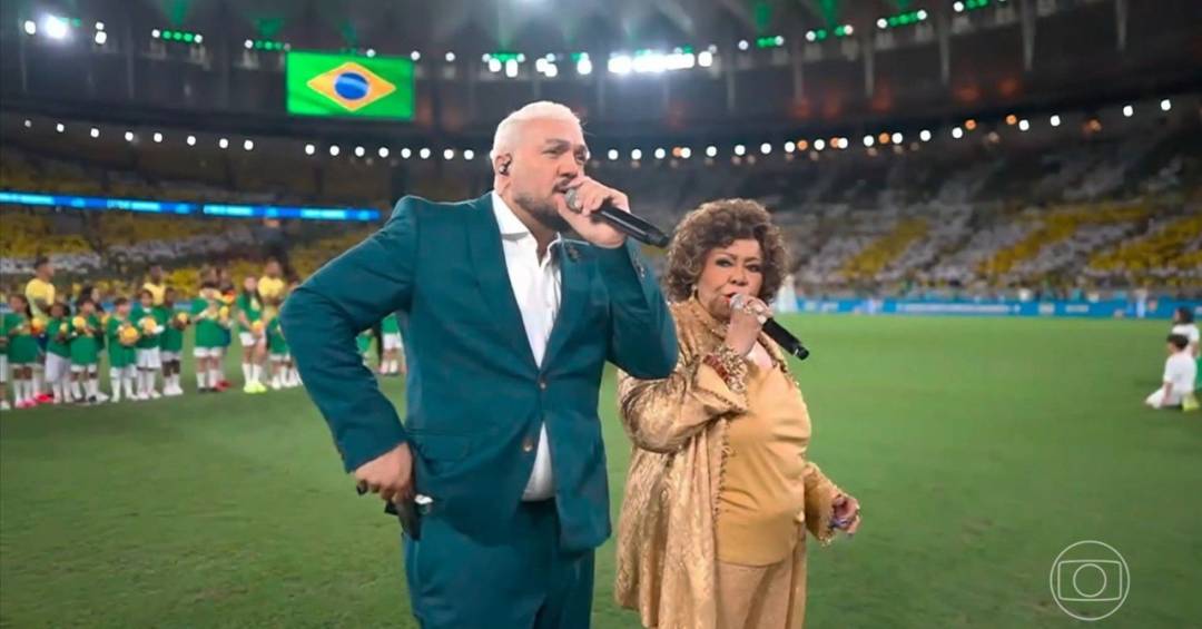 O incômodo de Belo ao cantar Hino Nacional com Alcione: amistoso da Seleção